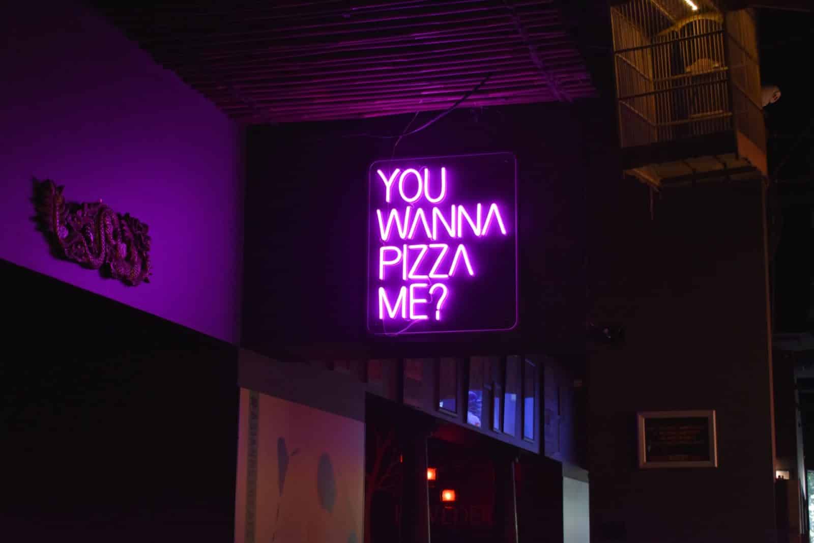 photo of a purple neon signage 2526839