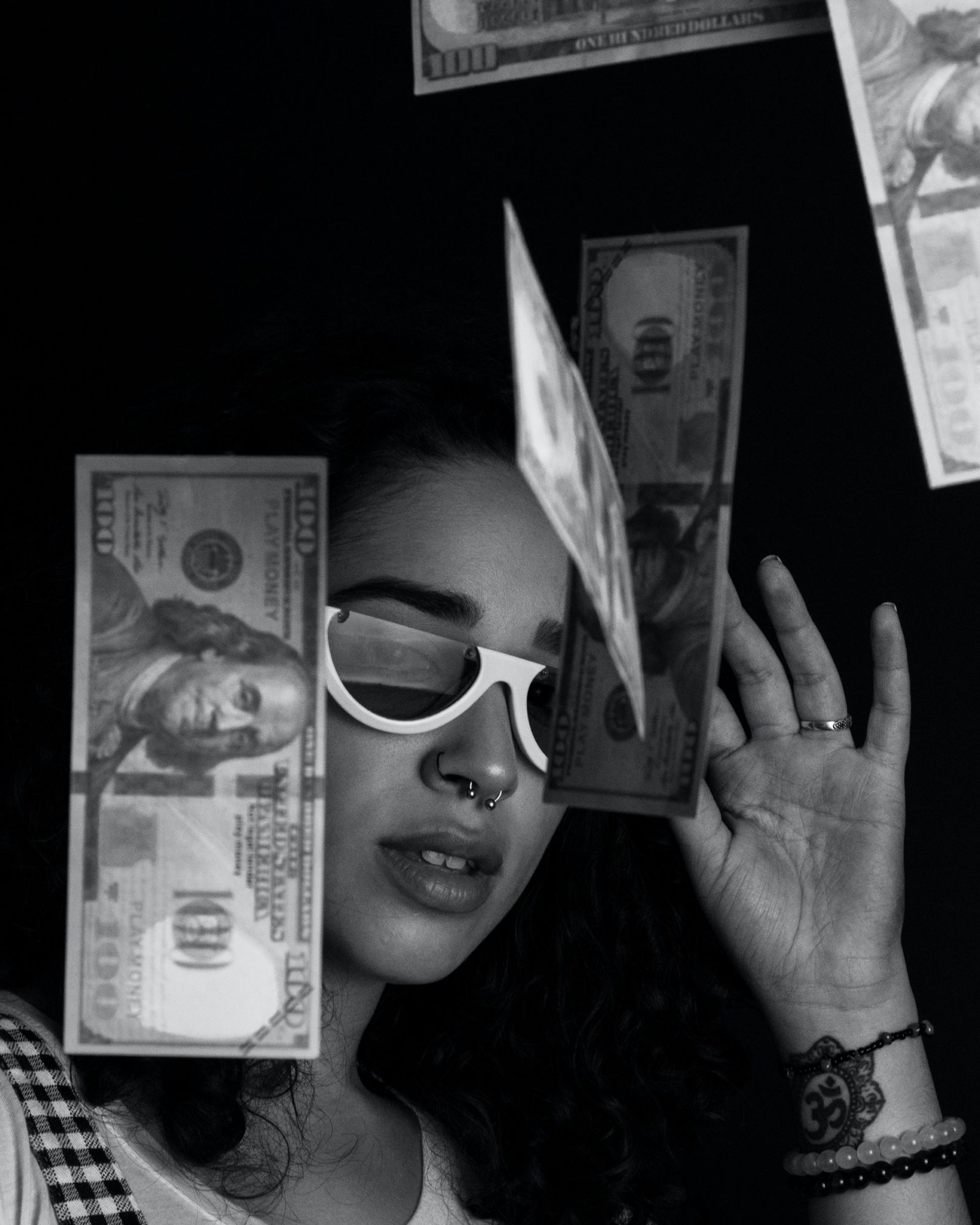 grayscale photography of a woman throwing 100 us dollar 2813350