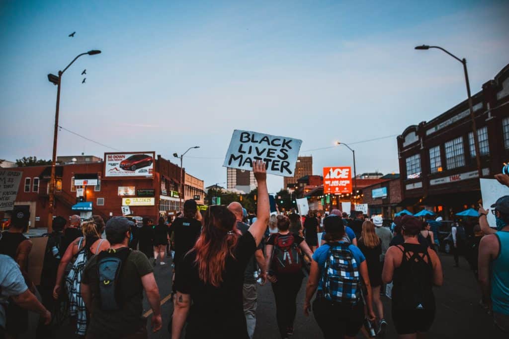 protesters walking on street 4552844