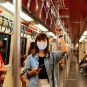 woman wearing a face mask on the subway 4436358