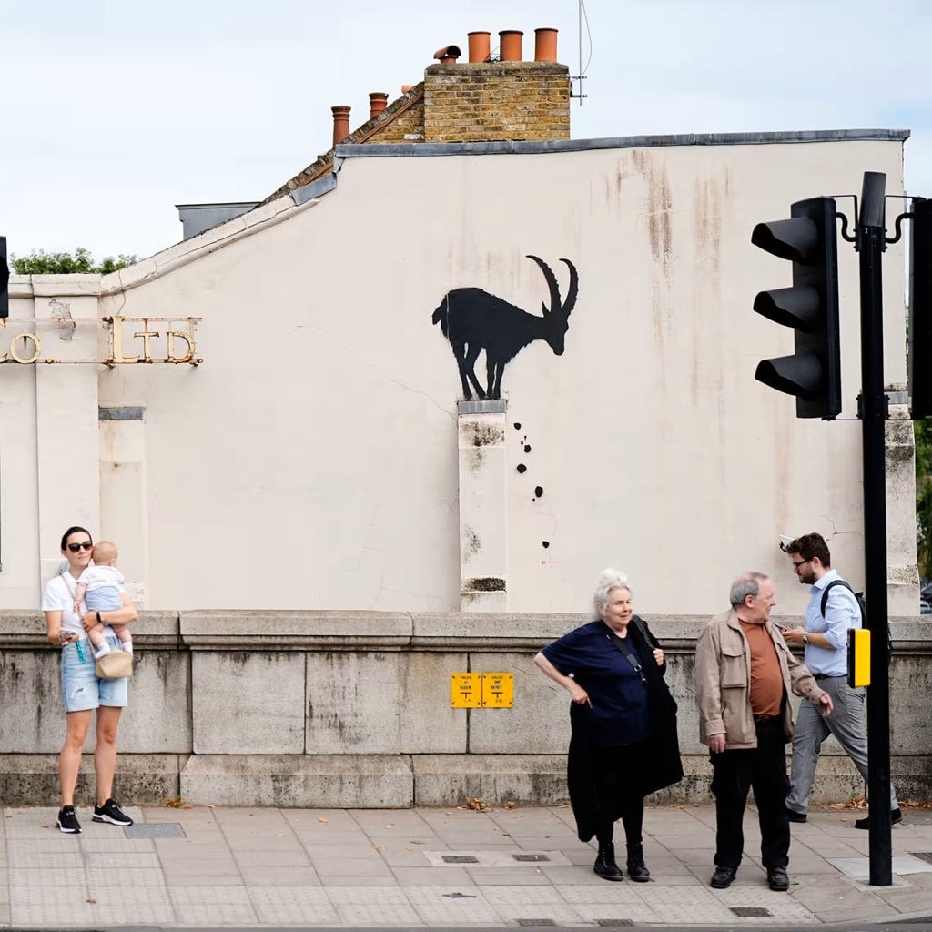 banksys goat on a wall near kew bridge in west london