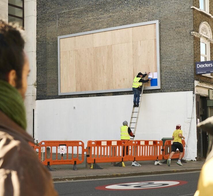 hp prints a billboard live on the street – one a4 sheet at a time